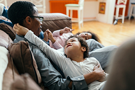 Parent with family at home