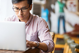 student working at home on computer